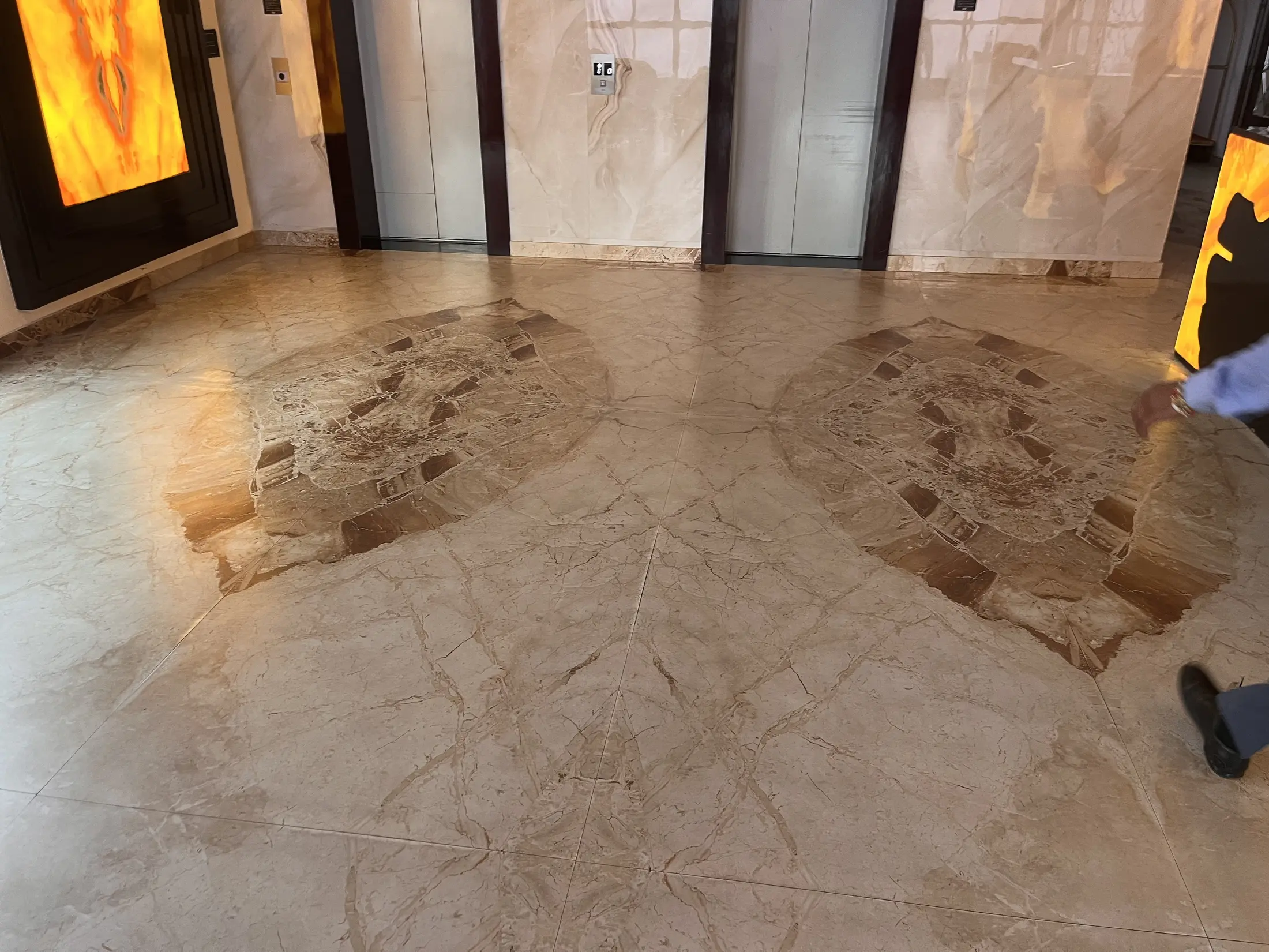 Book-matched marble floor installation in Amsterdam