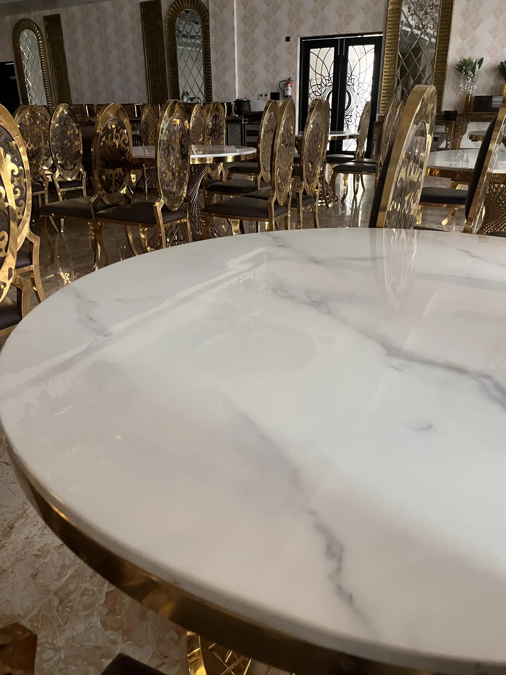 Detail of polished white marble dining tabletop
